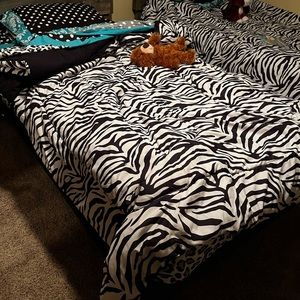 Twin Zebra light but pretty warm comforter.